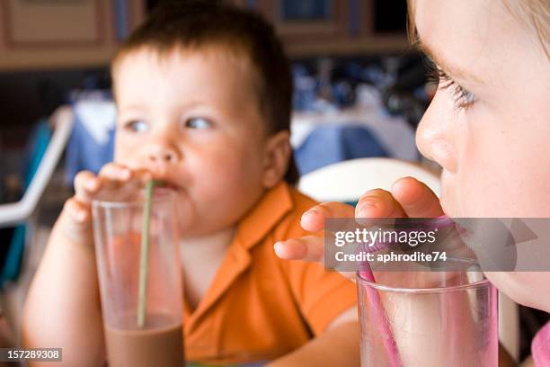 thirsty kids - chocolate milkshake stock pictures, royalty-free photos & images