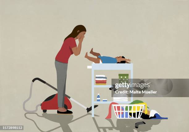 frustrated mother doing chores and changing diaper of baby at home - family house stock illustrations