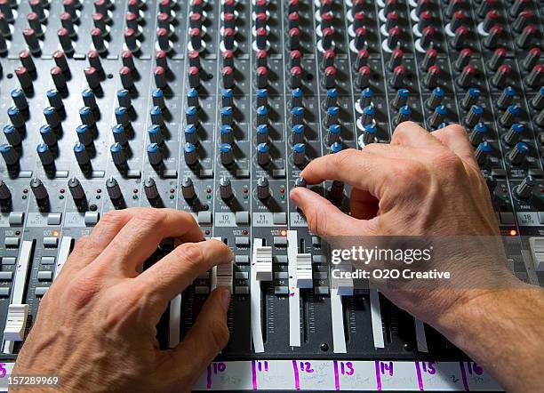 hands on soundboard - soundbooth stock pictures, royalty-free photos & images