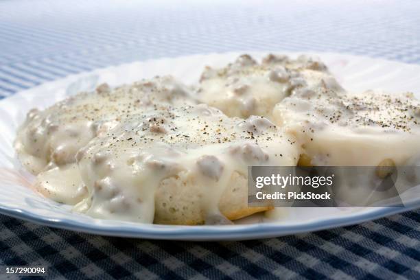 sausage gravy and biscuits - buttermilk biscuit stock pictures, royalty-free photos & images