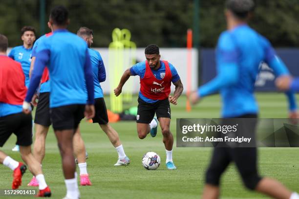 Darnell Furlong of West Bromwich Albion dribbles the ball during a training session at West Bromwich Albion Training Ground on August 2, 2023 in...