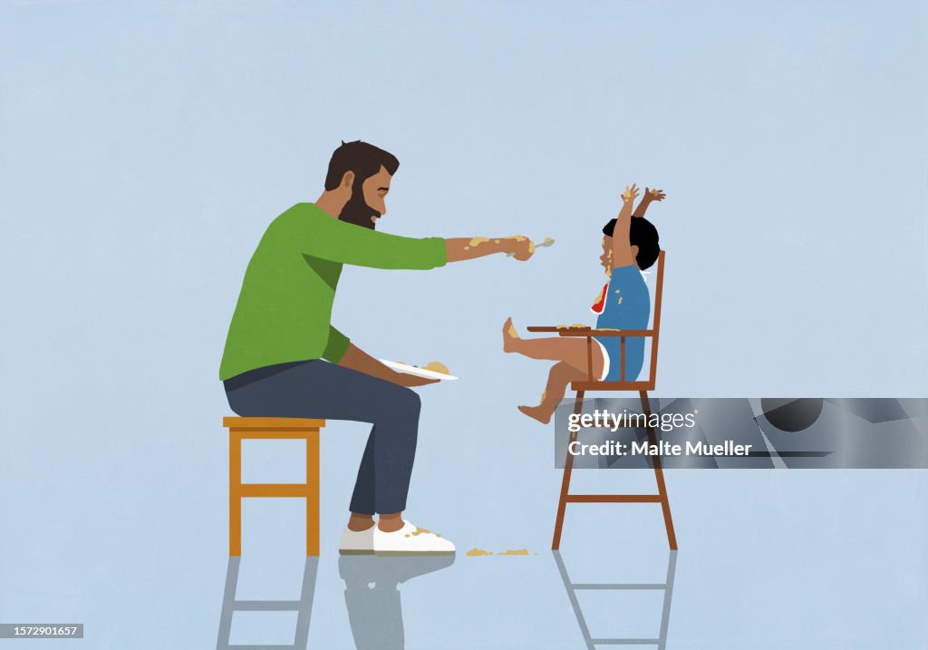 Father feeding messy baby in high chair