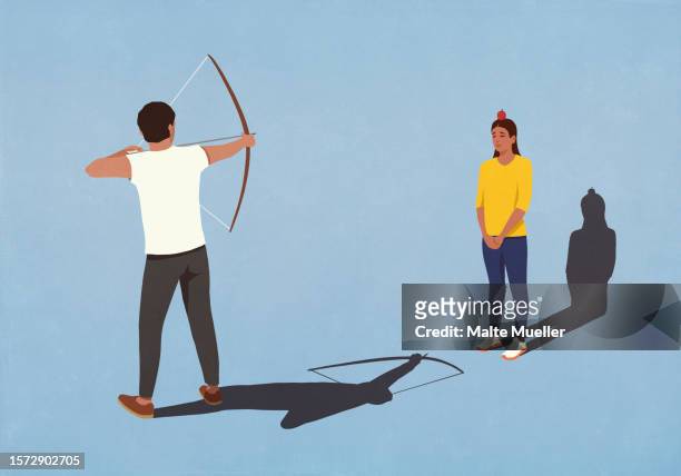 man with bow and arrow aiming for apple on head of frightened wife - aiming stock illustrations