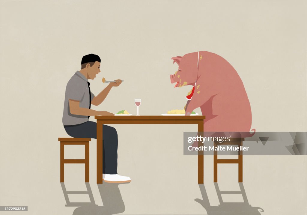 Man eating dinner with messy pig at dining table
