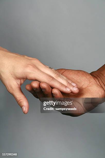 diverse hands - racism stock pictures, royalty-free photos & images