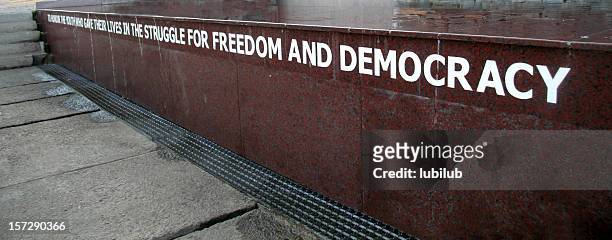 freedom and democracy from memorial in soweto, south africa - segregation stock pictures, royalty-free photos & images