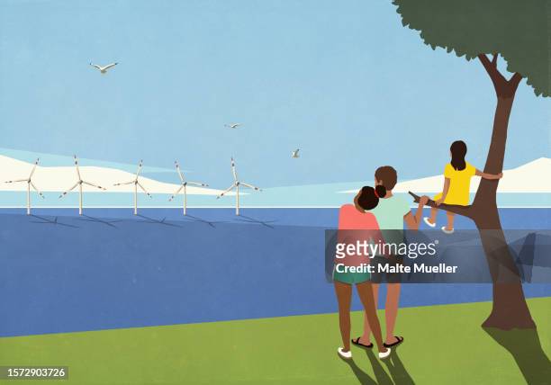 serene family looking at wind turbines in sunny ocean - family stock illustrations
