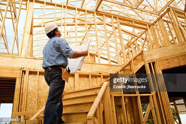 construction site inspection - house blueprint stockfoto's en -beelden