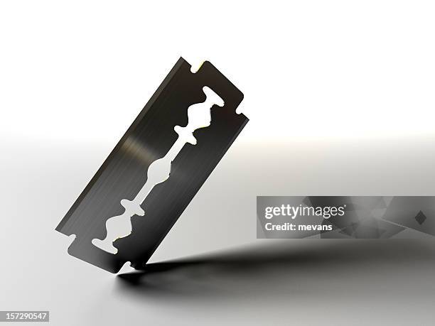 razor blade on white background - razor blade stock pictures, royalty-free photos & images