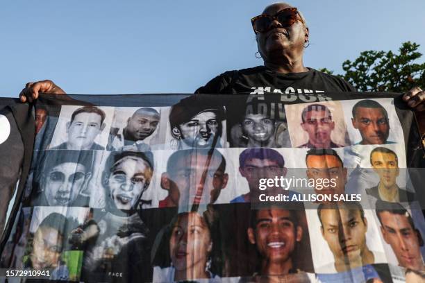 Resident protests against a police raid that killed 14 people in Guaruja, some 90 km from Sao Paulo, Brazil, on August 2, 2023.