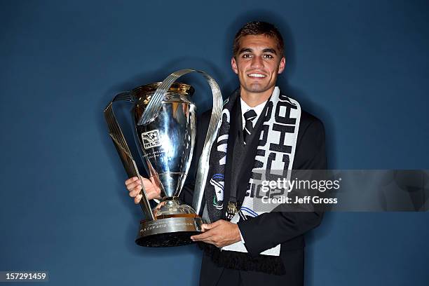 Hector Jimenez of the Los Angeles Galaxy poses after winning the 2012 MLS Cup 3-1 against the Houston Dynamo at The Home Depot Center on December 1,...