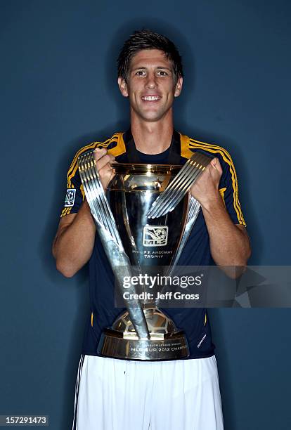 Andrew Boyens of the Los Angeles Galaxy poses after winning the 2012 MLS Cup 3-1 against the Houston Dynamo at The Home Depot Center on December 1,...