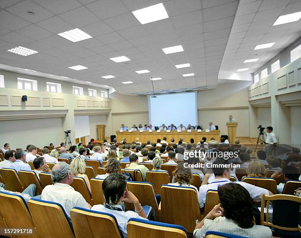 video conference - large auditorium stock pictures, royalty-free photos & images