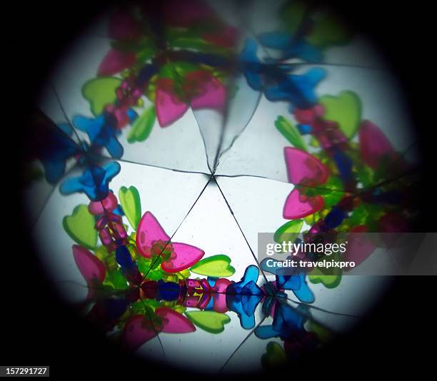 inside a kaleidoscope, abstract images in blue, green, pink - kaleidoscope heart stock pictures, royalty-free photos & images