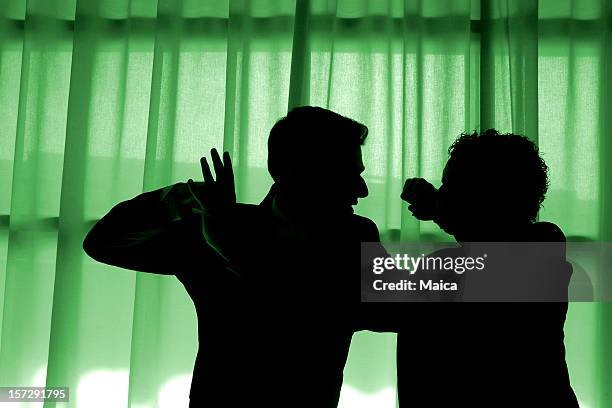 fight - men fighting stock pictures, royalty-free photos & images