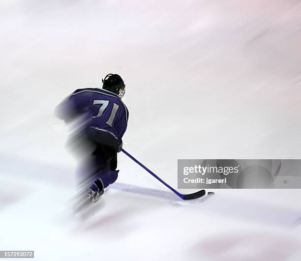 hockey player action shot - ice skater stock pictures, royalty-free photos & images