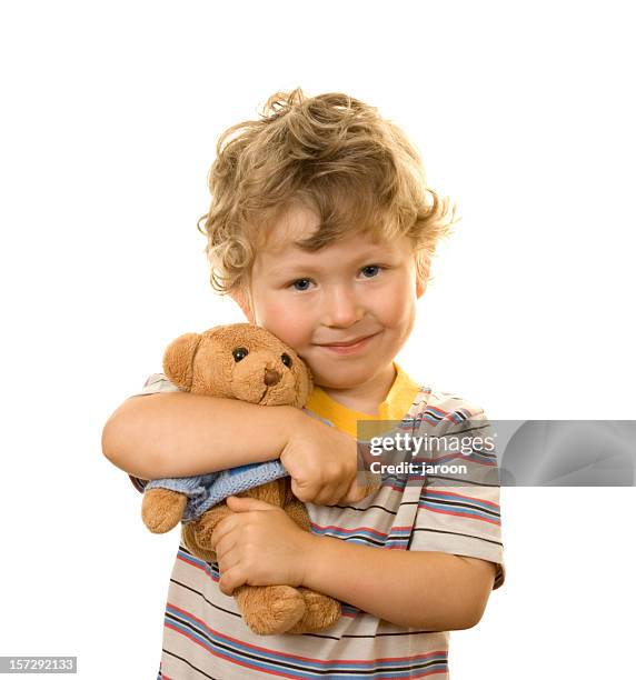 piccolo ragazzo e il suo orsacchiotto - teddy bear on white foto e immagini stock
