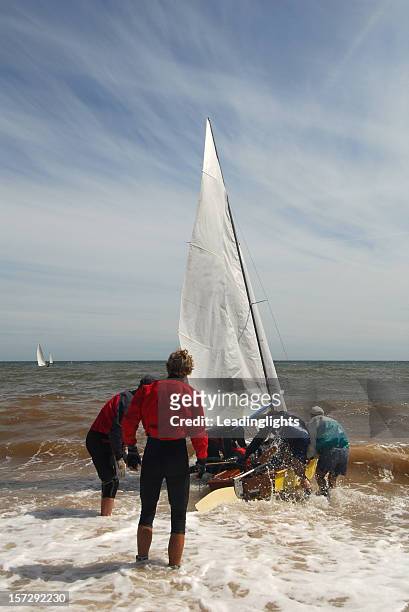 dinghy launch, devon - launching event stock pictures, royalty-free photos & images