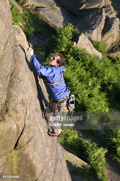 rock climber, stanage edge, peak district national park - soloing stock pictures, royalty-free photos & images
