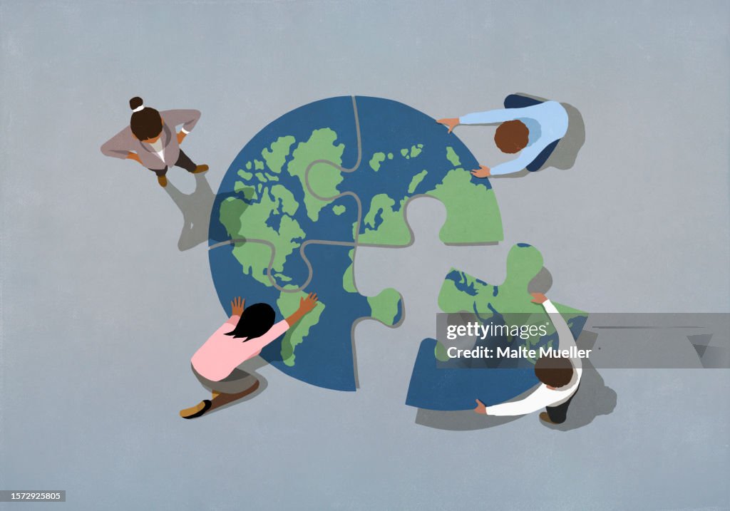 Global business people connecting earth jigsaw puzzle