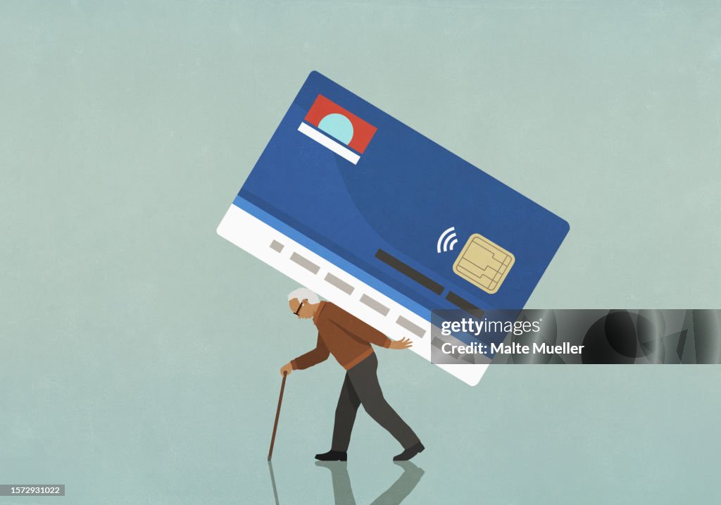 Senior man with cane walking with large credit card burden on back
