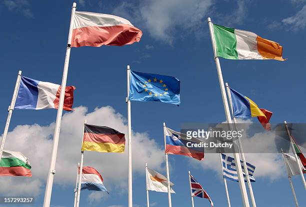 european union flags - western europe stock pictures, royalty-free photos & images