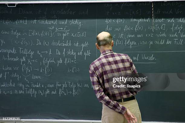 professor - physics chalkboard stock pictures, royalty-free photos & images