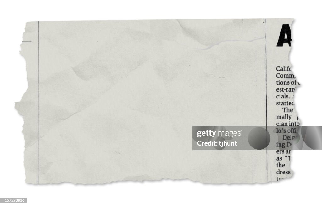 Un periódico desgarros en blanco