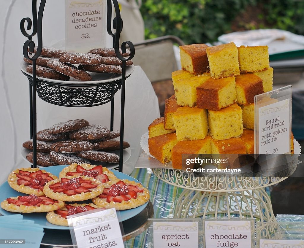 Cornbread and fresh chocolate cookies piled high at Farmers Market