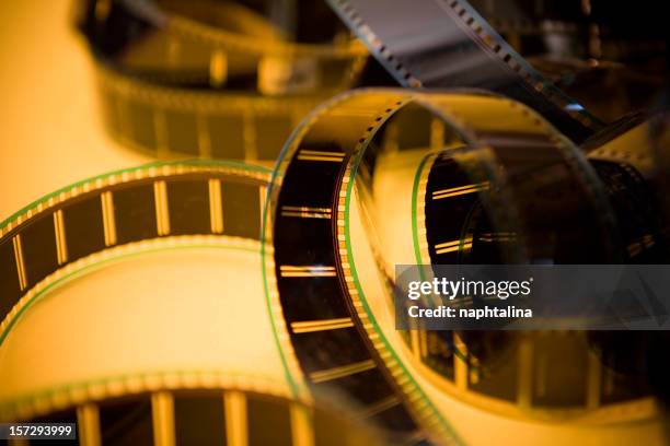 carretes de película - cinta de película fotografías e imágenes de stock