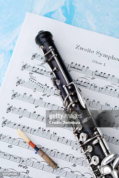 oboe, music and a reed - oboe stockfoto's en -beelden