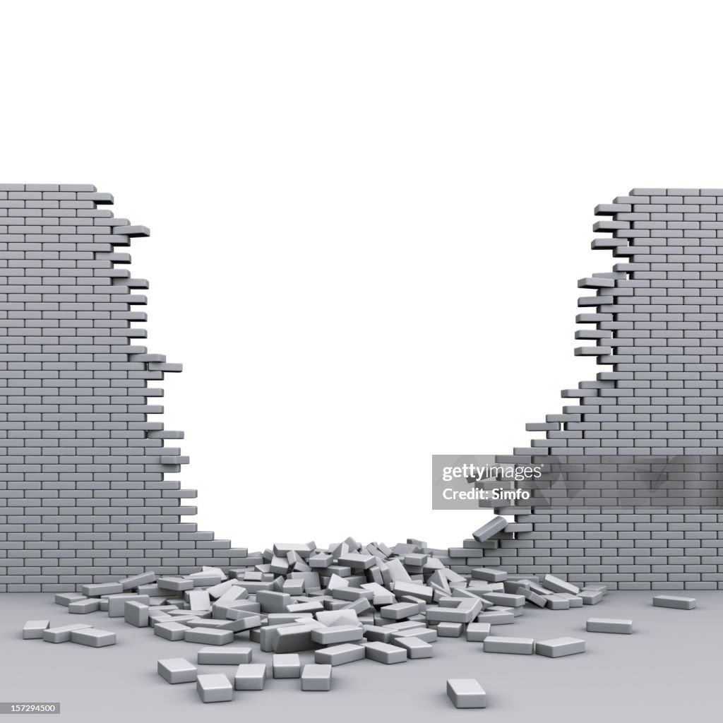 A destroyed brickwall with broken bricks