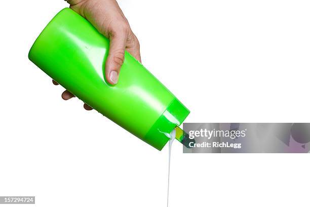 hand pouring shampoo - shampoo bottle white background stock pictures, royalty-free photos & images