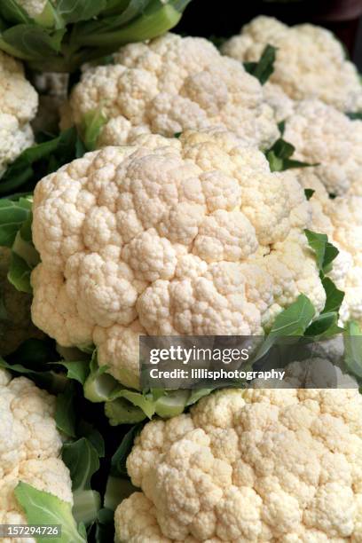 cauliflower at market - cauliflower stock pictures, royalty-free photos & images