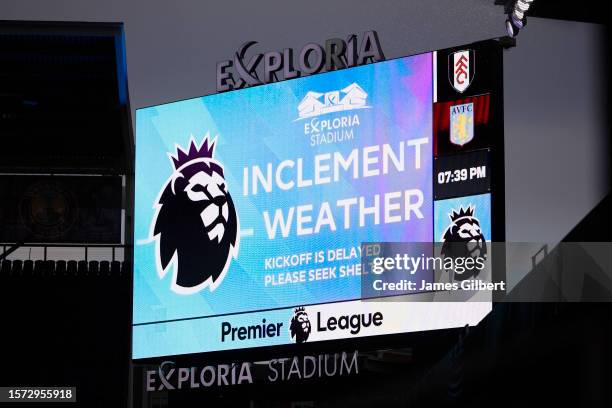 Weather message is displayed on the LED screen as bad weather delays kick off prior to the Premier League Summer Series match between Aston Villa and...