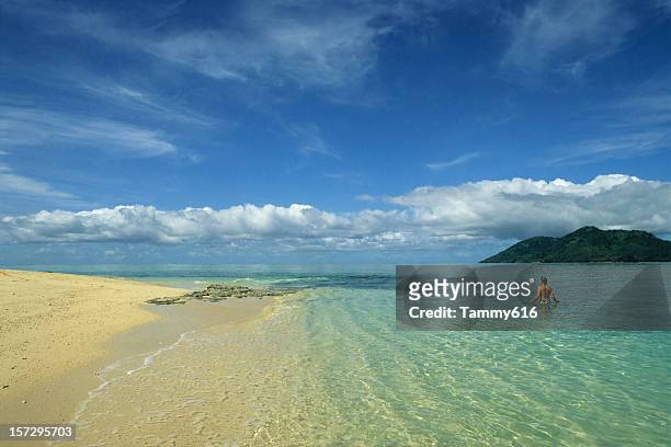a breath-taking view of fantasy island with clear waters - fiji stockfoto's en -beelden