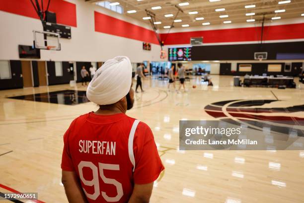 August 2 - Raptors Superfan Nav Bhatia watches Canada's men's basketball team during the FIBA Men's Basketball World Cup training camp at the OVO...