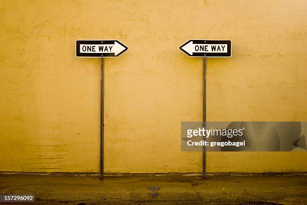 opposite ways - one direction stock pictures, royalty-free photos & images