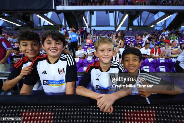 Fans of Fulham look on during the Premier League Summer Series match between Aston Villa and Fulham FC at Exploria Stadium on July 26, 2023 in...