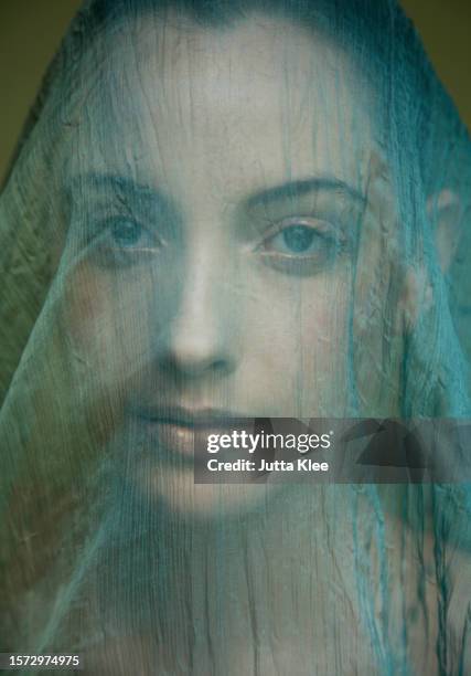 portrait of young beautiful woman with light green veil - veil face stock pictures, royalty-free photos & images