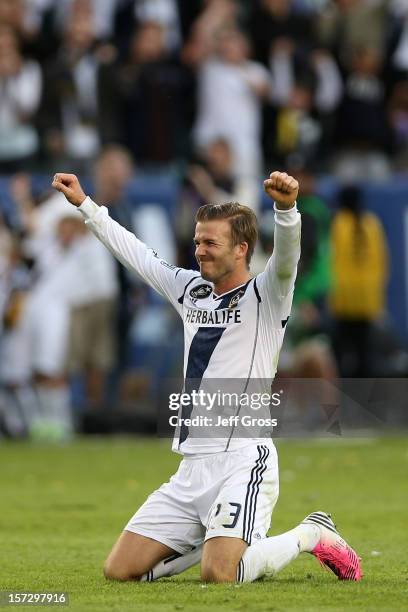 David Beckham of Los Angeles Galaxy celebrates in the second half against the Houston Dynamo in the 2012 MLS Cup at The Home Depot Center on December...