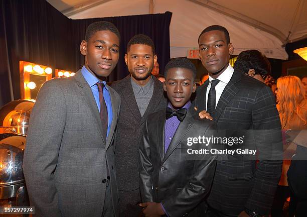 Actor Kwame Boateng, singer Usher and actors Kwesi Boakye and Kofi Siriboe attend UNCF's 34th Annual An Evening Of Stars held at Pasadena Civic...