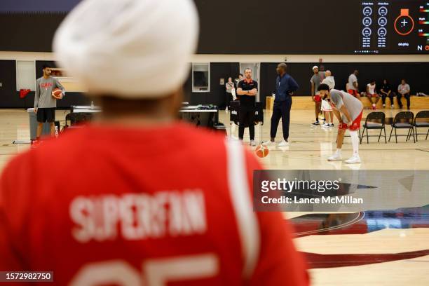 August 2 - Raptors Superfan Nav Bhatia watches Jamal Murray of Canada's men's basketball team during the FIBA Men's Basketball World Cup training...