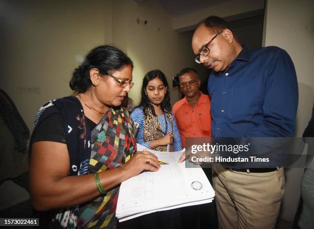 Patna District Magistrate Chandrashekhar Singh looking enumerator staff who collect information from residents for a caste-based census in Bihar...