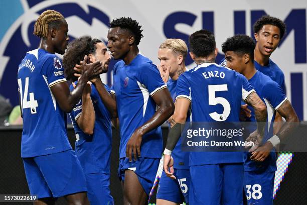 Nicolas Jackson of Chelsea celebrates with team mates after scoring their sides first goal during the Premier League Summer Series match between...