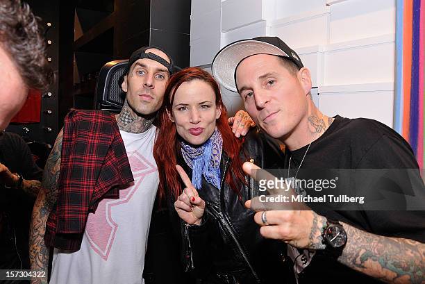 Blink 182 drummer Travis Barker, actress Juliette Lewis and musician Toby Morse attend the launching of the One Life One Chance web store on December...