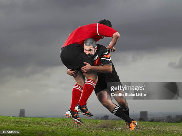 rugby tackle. - placcare foto e immagini stock