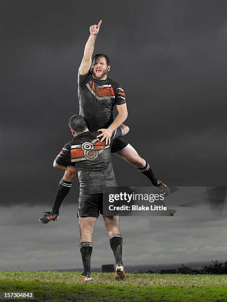 rugby players celebrating. - rugby team stock pictures, royalty-free photos & images