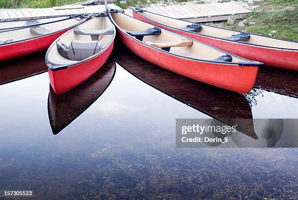 red canoes - north cove stock pictures, royalty-free photos & images