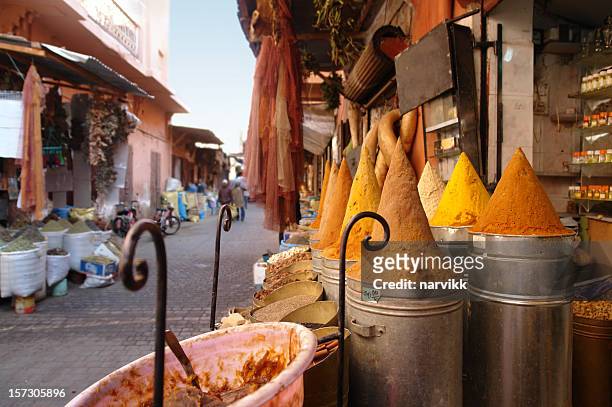 shop with spices on the street in marrakesh - morocco spices stock pictures, royalty-free photos & images